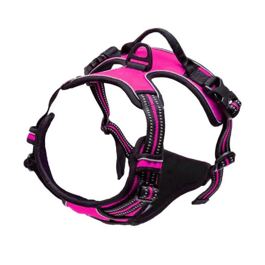 A pink and black adjustable no-pull dog harness with reflective strips and a handle.