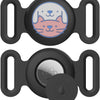 A black silicone airtag holder with a cat face design, designed to attach to pet collars.