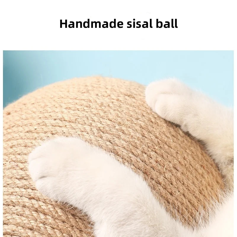 A handmade sisal ball toy with a wooden base and white cat paws resting on the rope.