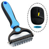 A black pet grooming brush with a blue handle and a black silicone cleaning pad is shown.