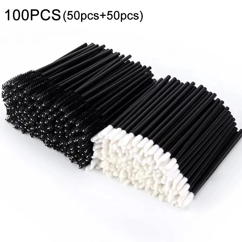 A collection of 100 disposable eyelash and eyebrow brushes, split into 50 black and 50 white brushes.
