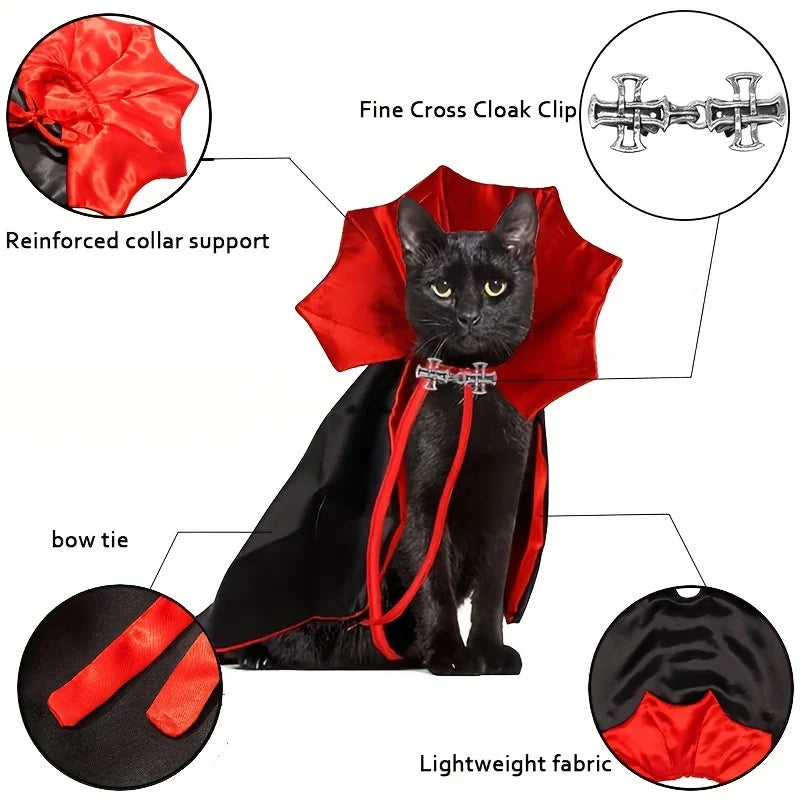 A black cat wearing a red vampire cape and collar costume set with a bow tie and fine cross clip