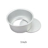 A round aluminum cake pan set consisting of a ring and a separate disc, shown in white.