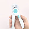 A hand holds a white pet nail clipper with a light blue accent, showing the professional grooming tool.