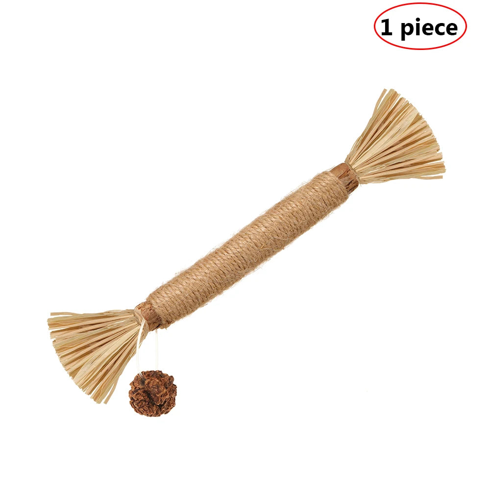 A natural silvervine cat chew toy made of straw fibers with a decorative tassel and a small ball at the end.