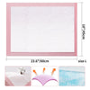 Pink quilted dog pee pads showing the product size and texture, with close-ups of the pads and a blue water effect.