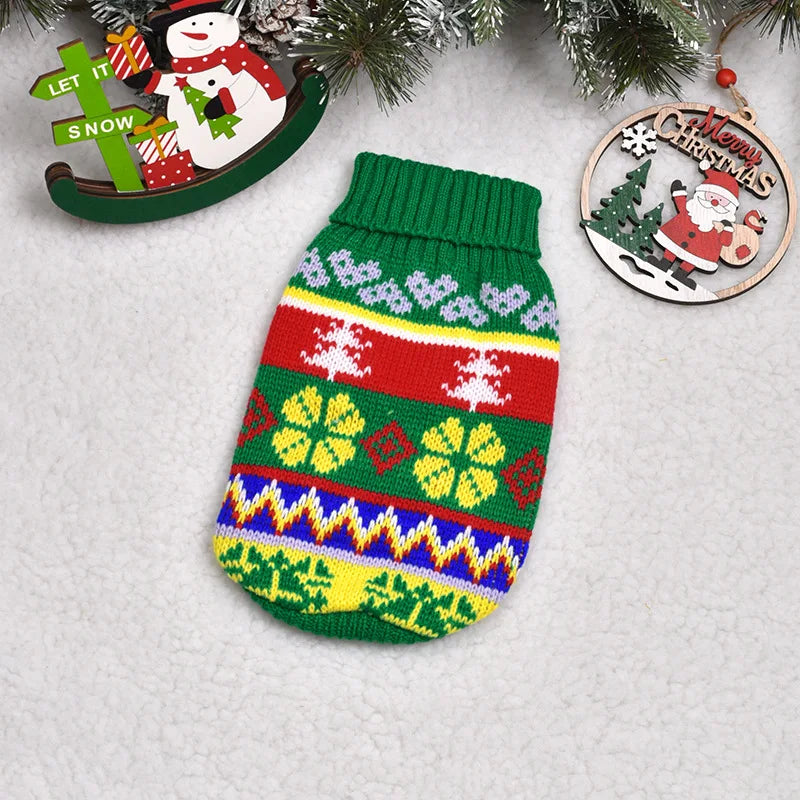 A knitted green Christmas sweater featuring colorful Nordic patterns and festive holiday designs.