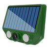 A green solar pest repellent device with a glass panel angled toward the sun.