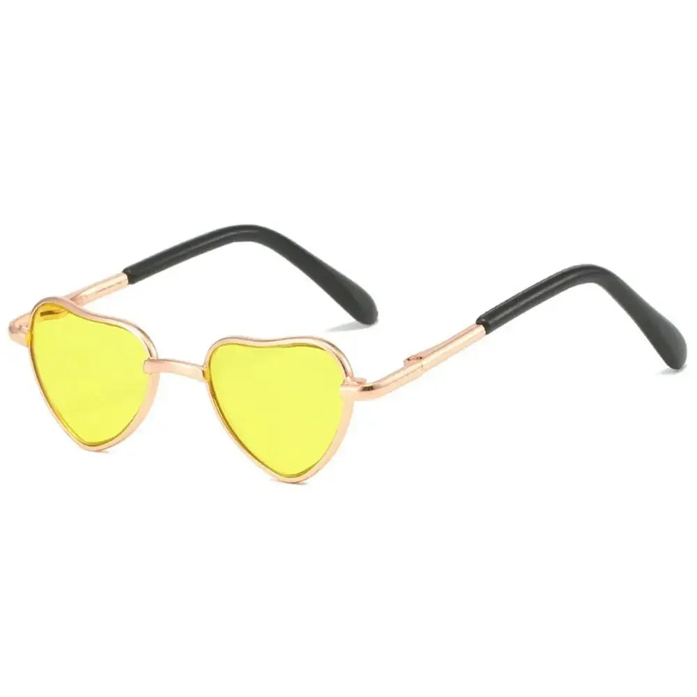 Yellow heart-shaped pet sunglasses for cats and dogs with gold-toned metal frames