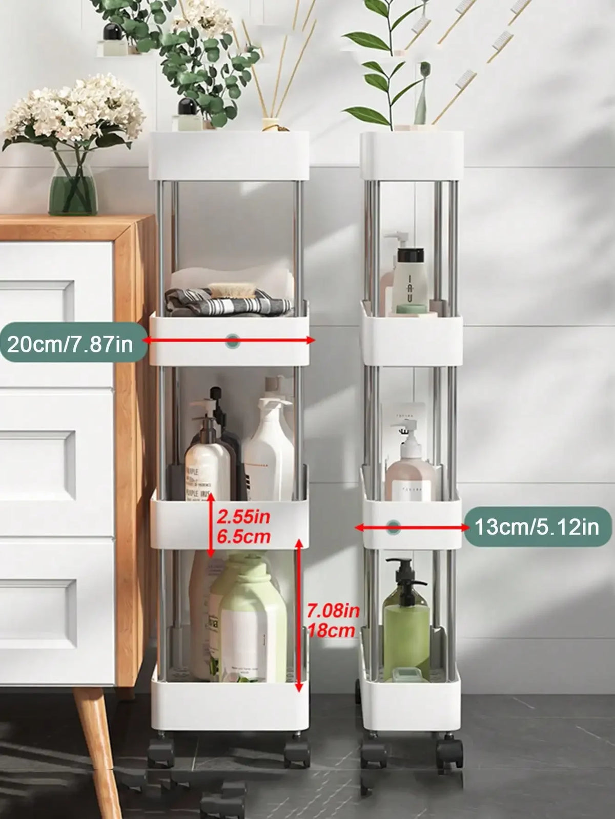 A white mobile storage rack with three tiers holding various bottles and plants on a wooden cabinet.