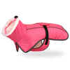 A bright pink reflective winter coat for dogs with a fluffy white collar and black trim.