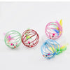 Colorful interactive cat toy featuring a rolling mouse design with pink, green, and yellow elements.