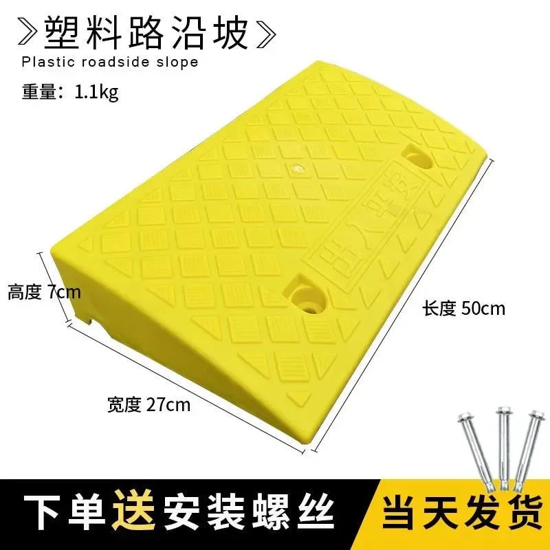 Yellow plastic roadside slope ramp measuring 7cm high, 27cm wide, and 50cm long.