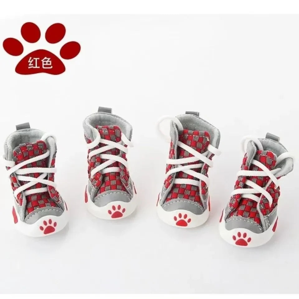 A set of four red and gray Teddy Bear soft sole shoes for small dogs