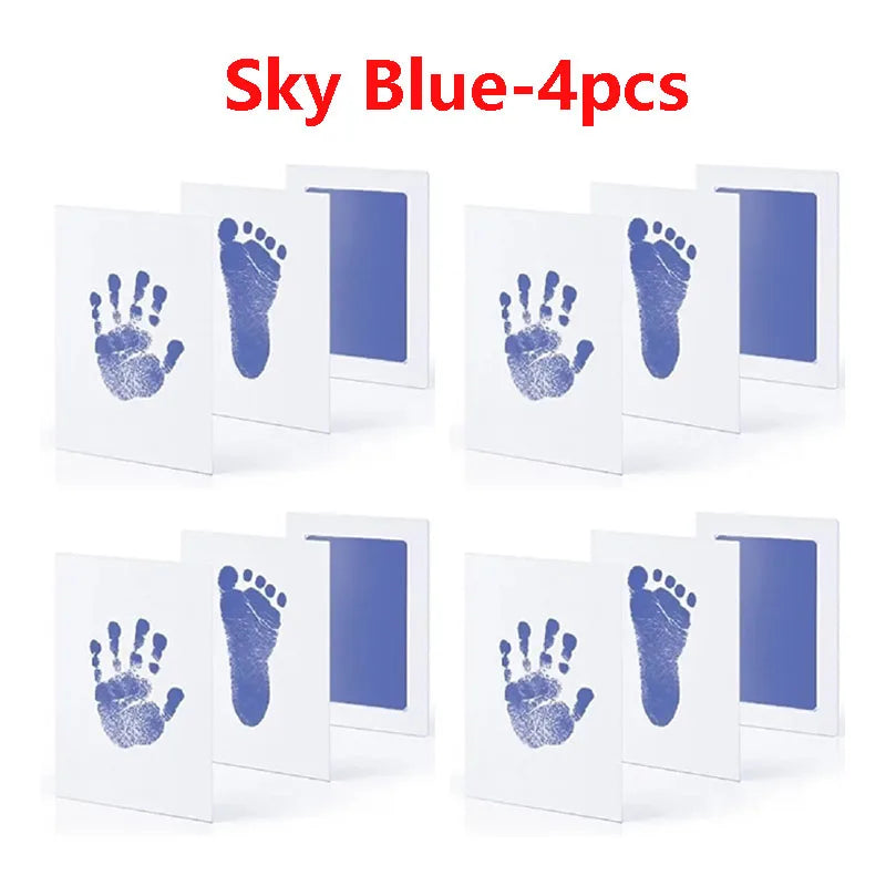 Four sky blue baby handprint and footprint kits displayed on a white background.