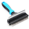 A black and blue deshedding brush for dogs and cats with a silicone handle and metal comb.