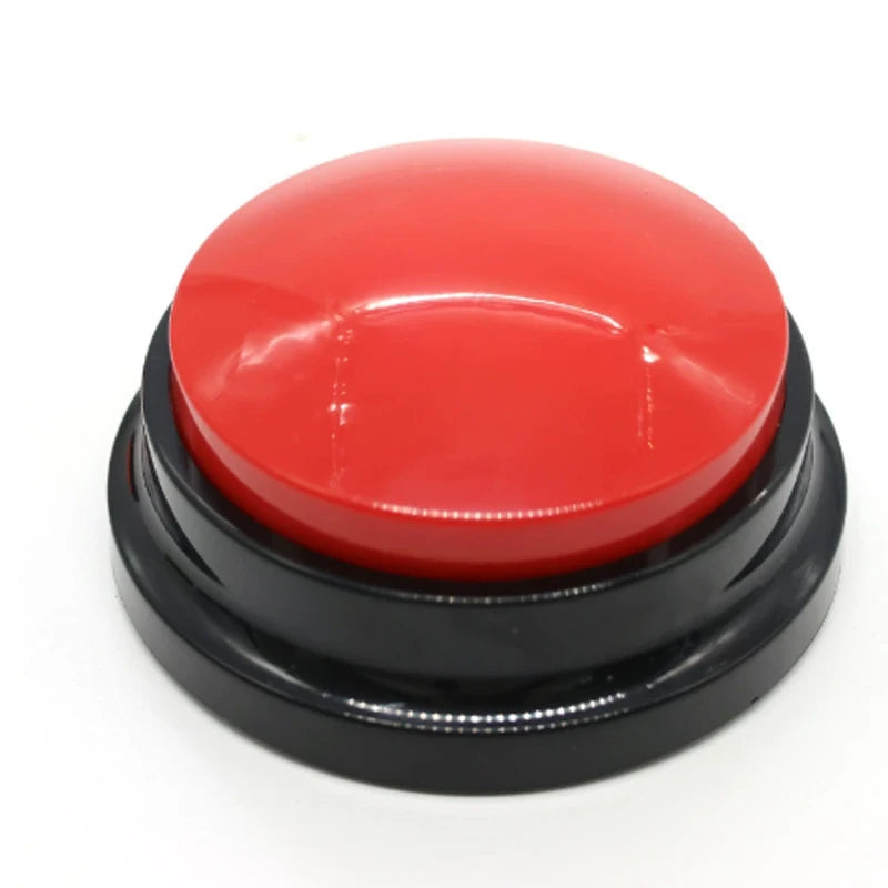 A round, bright red button with a black base for dog training.