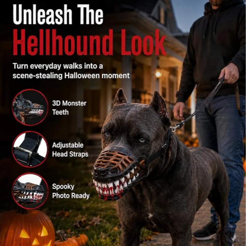 A dark-colored dog wearing a Halloween-themed muzzle costume with sharp teeth and red accents.
