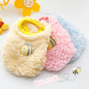 A fluffy yellow and pink velvet pet sweater with bee embroidery is shown on a white background.