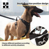 A German Shepherd wearing a black dog harness designed for double traction position changes.