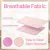 Pink breathable fabric cooling mat with a mesh bottom and stain-resistant surface.