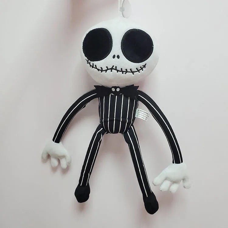 A white cartoon skeleton dog plush toy with black features and striped limbs.