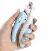 A hand is holding a white and light blue LED pet nail clipper tool for dogs and cats.