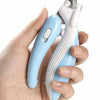 A hand holds a light blue LED pet nail clipper tool designed for dogs and cats.