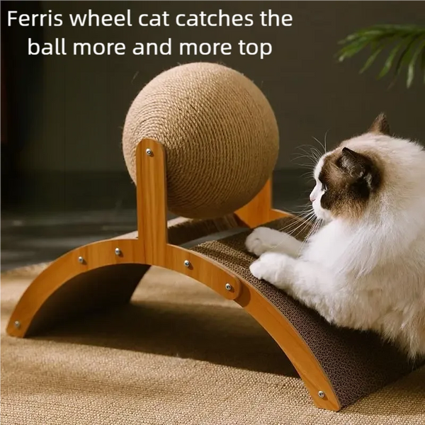 A white cat is playing with a large ball on a wooden cat scratcher featuring a sisal surface.