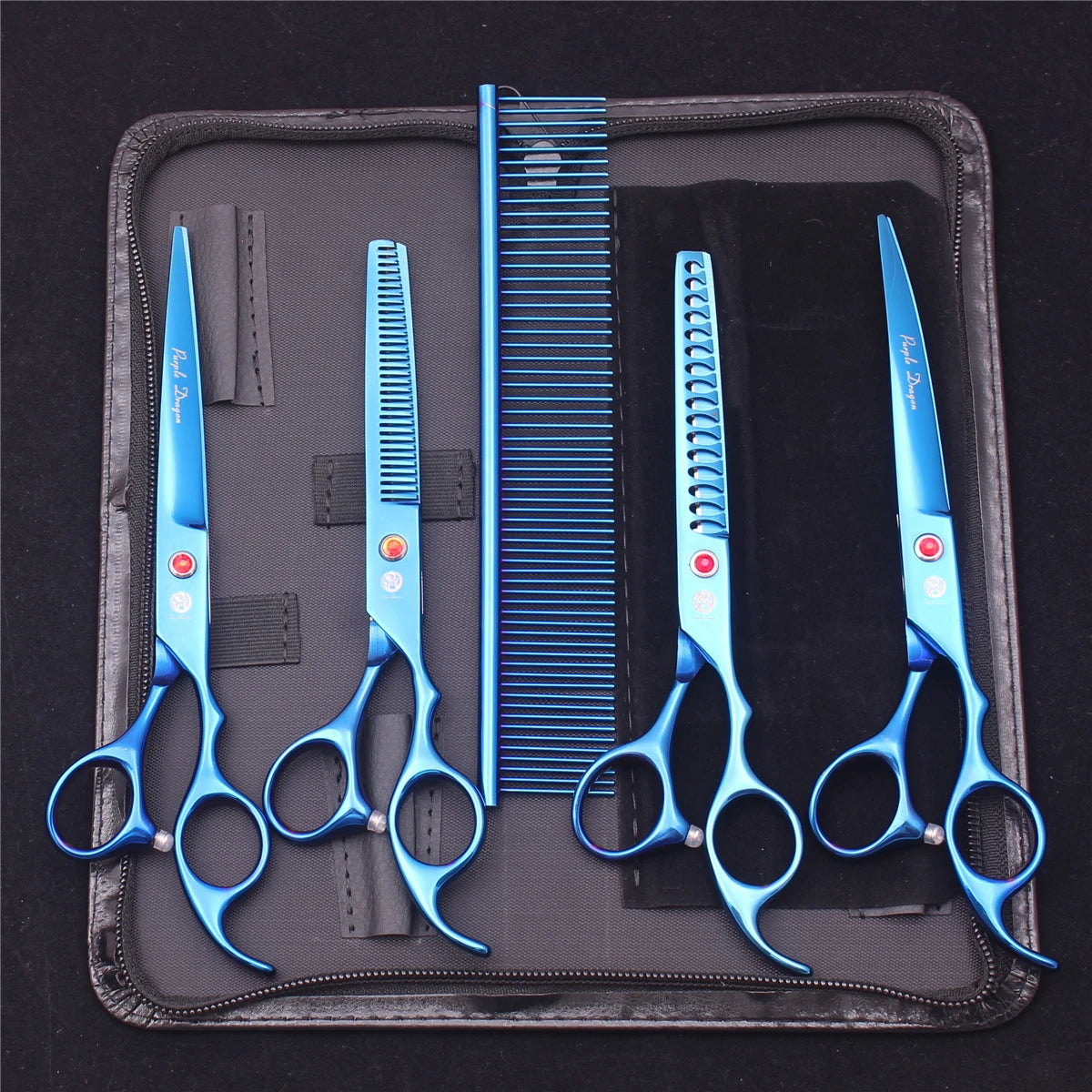 A set of professional stainless steel pet grooming scissors and combs stored in a black case.