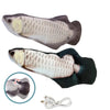 A realistic plastic model of a fish used as an interactive electric floppy cat toy with attached wires.