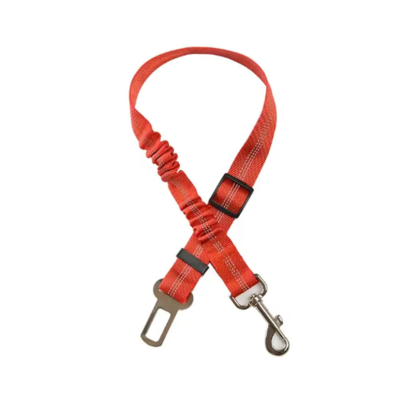 Arnés de seguridad naranja y duradero para perros con correa amortiguadora y clip de metal.