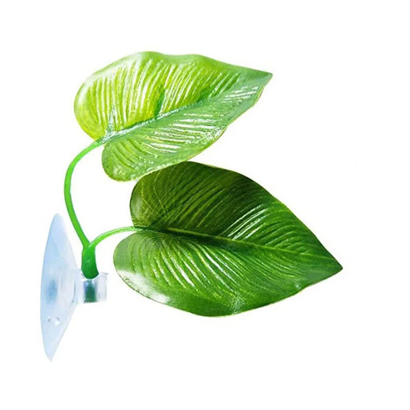A vibrant green Betta fish resting leaf hammock with a clear suction cup.