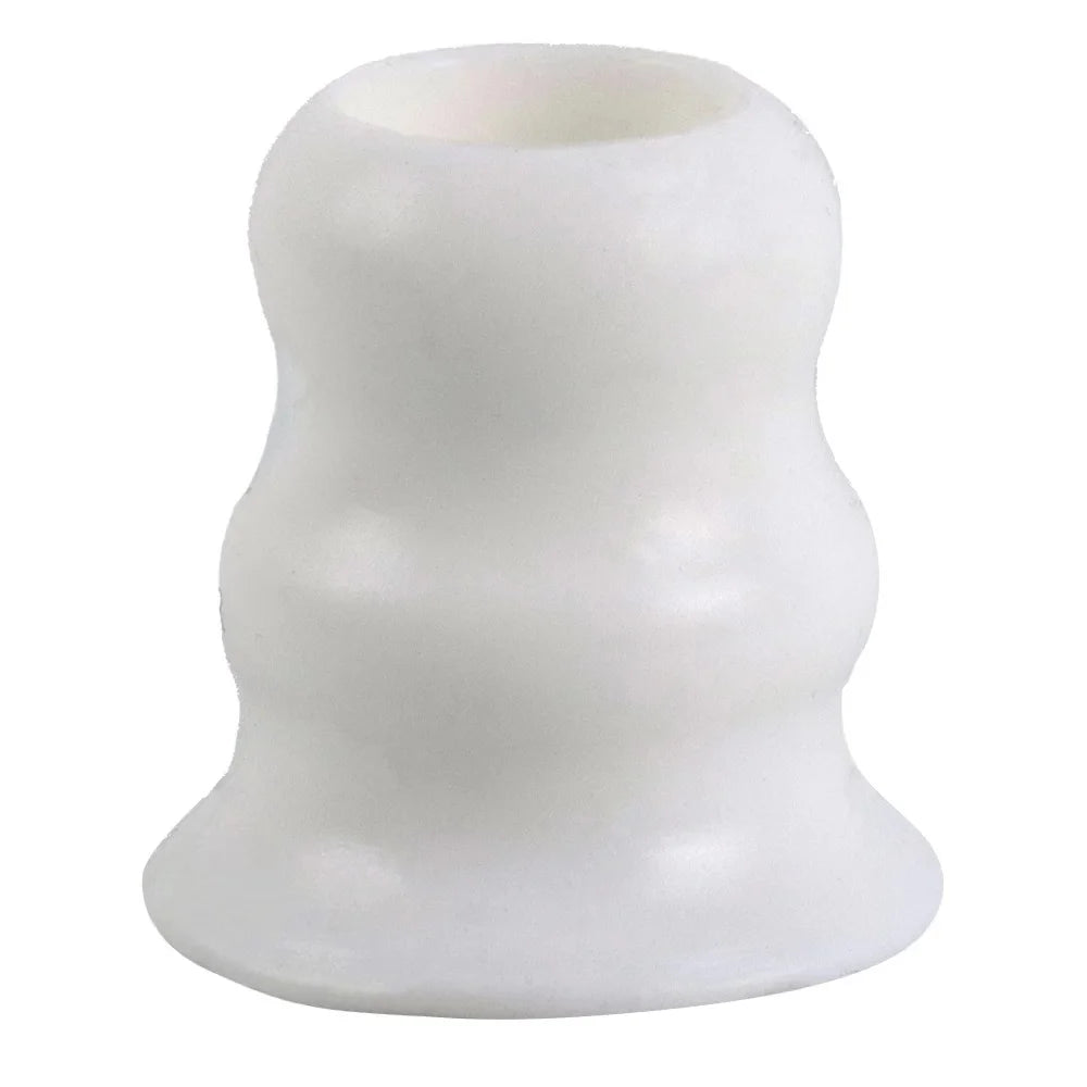 White silicone bat grip knobs used to improve control on baseball bats