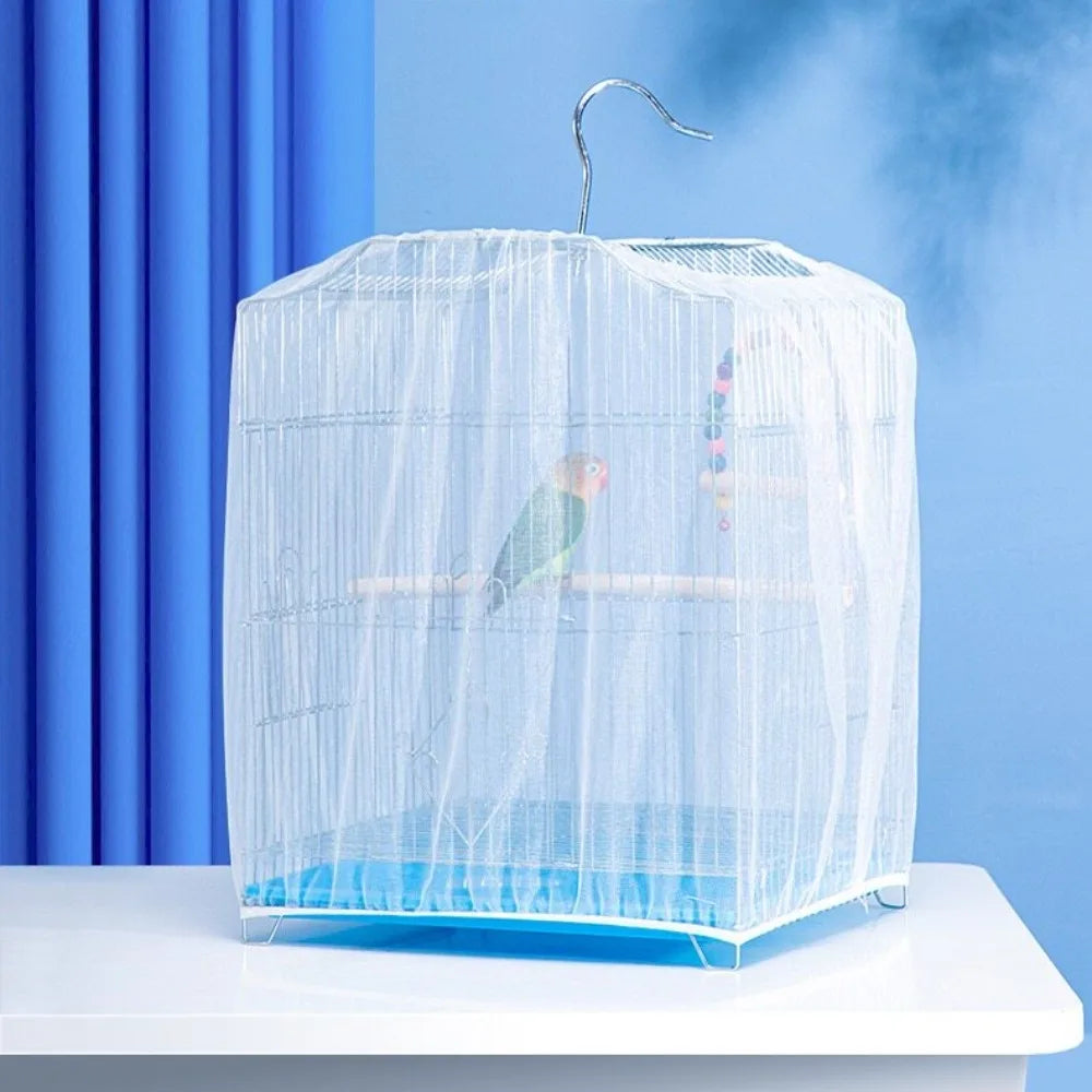 A clear mesh bird cage cover with a curved hook is displayed on a white surface against a blue background.