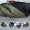 A foldable washable waterproof dog bed mat shown in various folded and unfolded states.