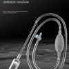 A clear silicone water changer and sand washing tool with a siphon pump is shown on a dark surface.