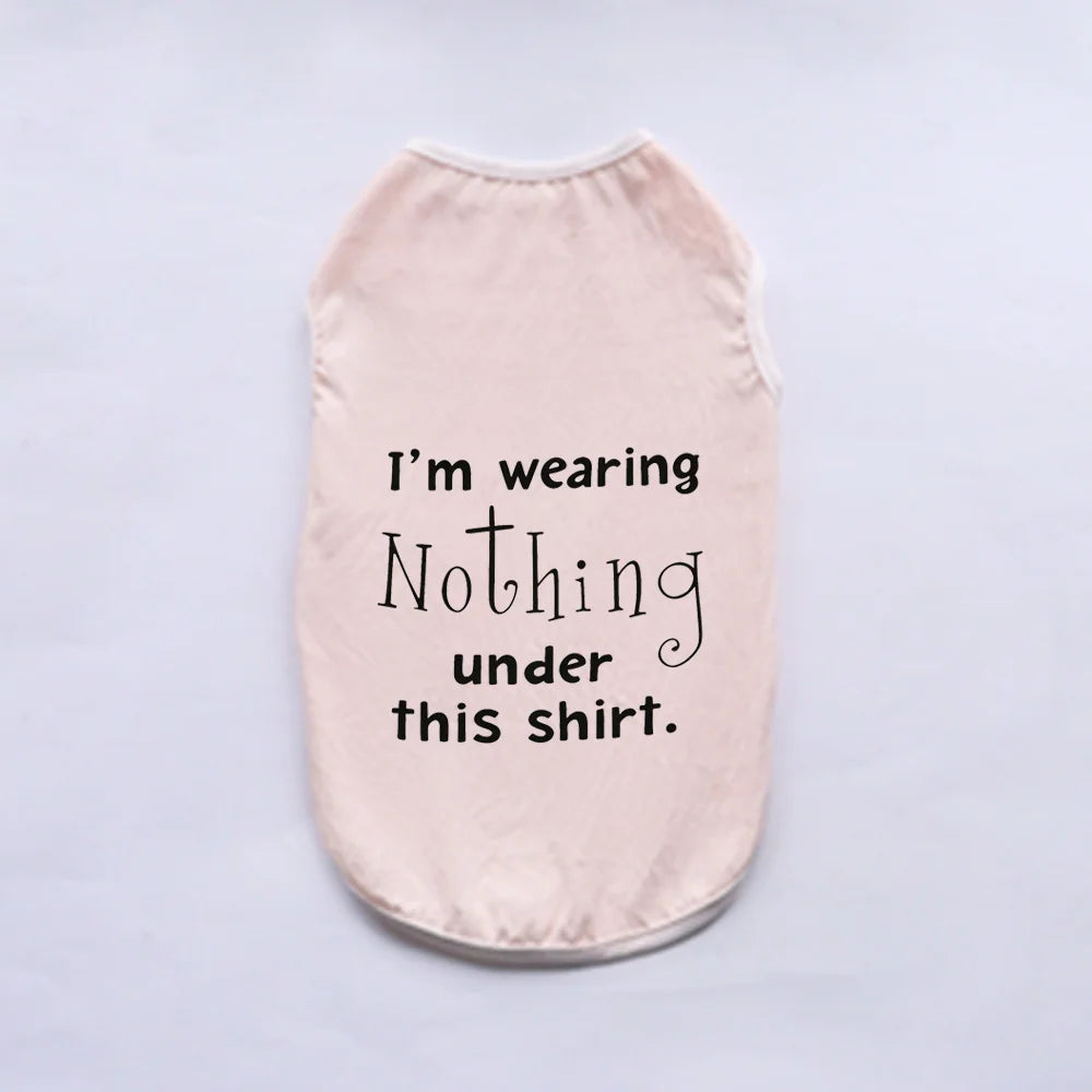 A light pink breathable summer pet vest with black text that reads I'm wearing Nothing under this shirt.