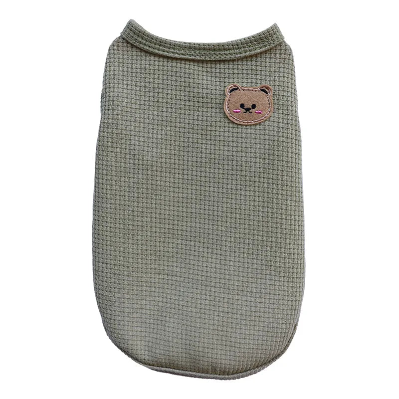 A light olive green cotton pet t-shirt for small dogs and cats featuring a cute bear face embroidery.