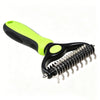 A bright lime green and black pet detangler comb and grooming brush.