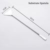 Espátula de acero inoxidable con una longitud de 32 cm y una punta de 7 cm.