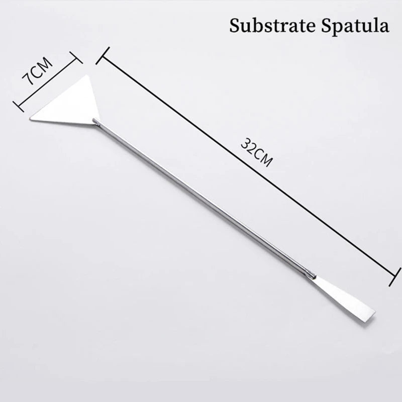 Espátula de acero inoxidable con una longitud de 32 cm y una punta de 7 cm.