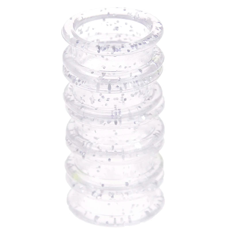 A stack of clear silica gel hair scissors, showing multiple rings of the product.