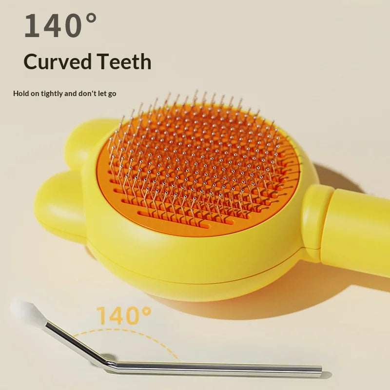 Yellow pet deshedding brush with curved teeth and a 140 degree angle shown next to a grooming tool.