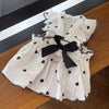 White pet dress with black bow and scattered black hearts for small dogs and cats