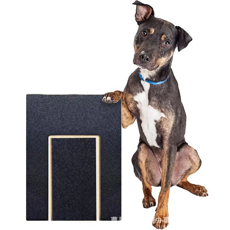 A small dog is sitting next to a dark wooden nail scratch board with a treat box.