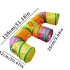 A yellow and orange foldable cat play tunnel coiled for indoor exercise.