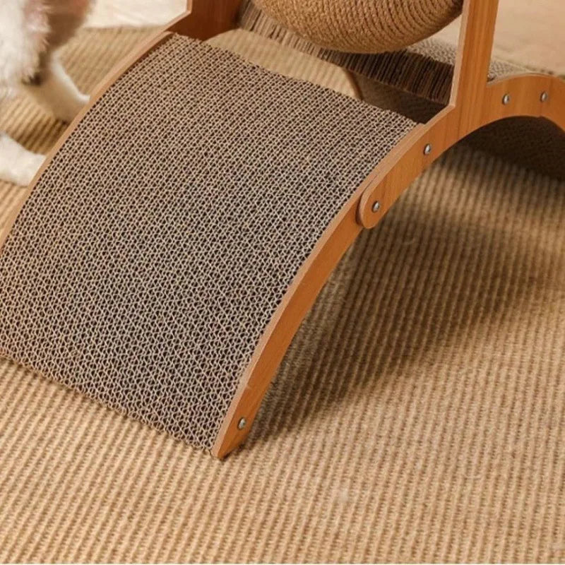 A wooden cat scratcher ball with a sisal-covered surface resting on a beige carpet.