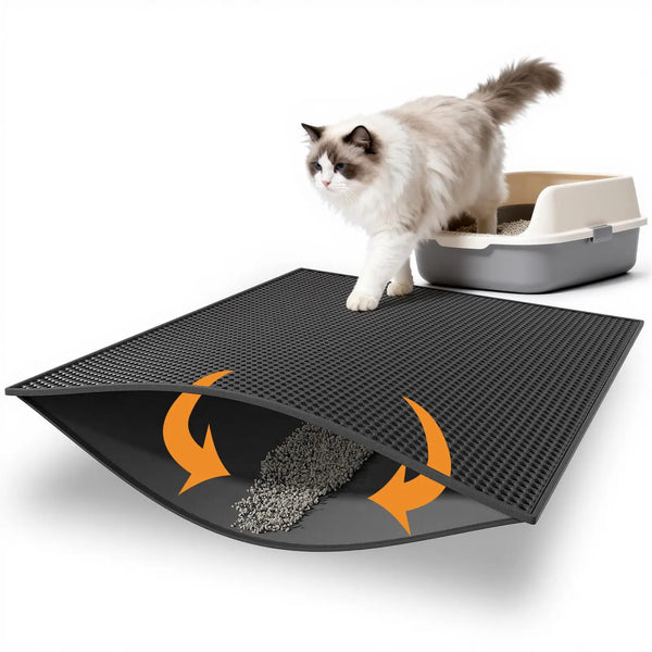 A fluffy white and gray cat is standing on a black honeycomb double-layer cat litter mat.