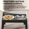 A black elevated dog feeder with two stainless steel bowls is shown on a surface.